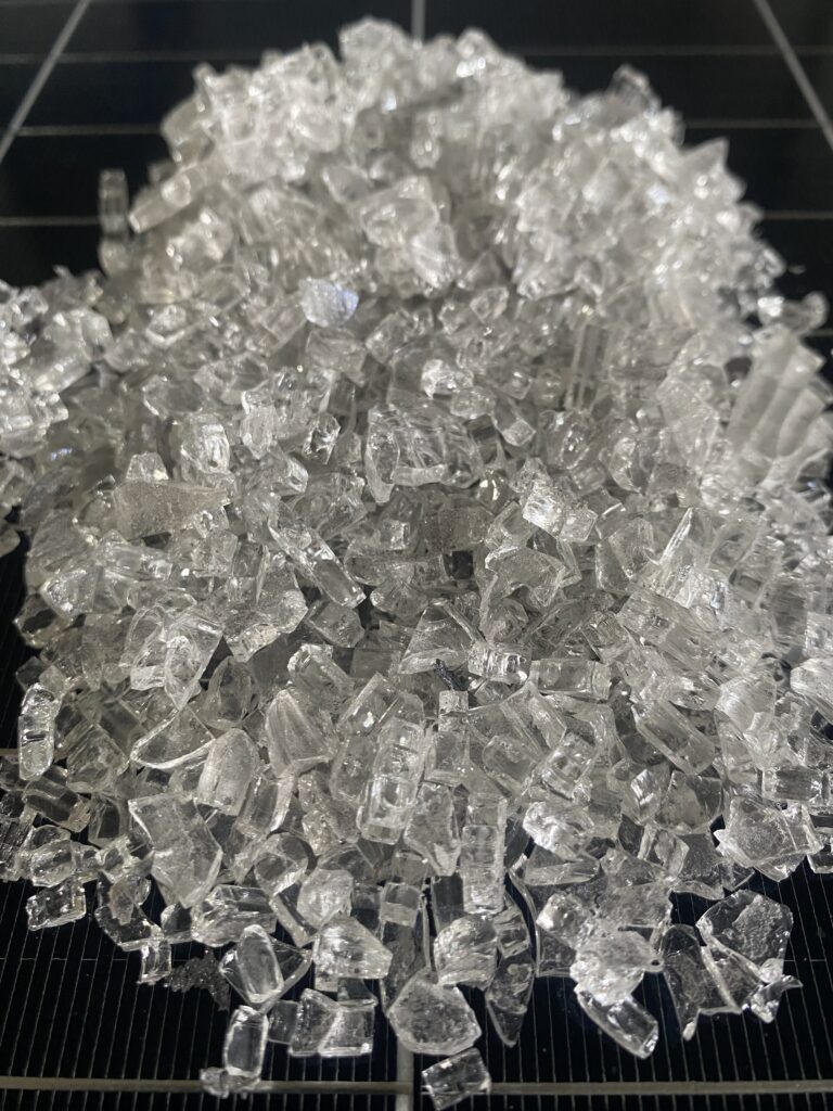 Recovered glass from solar module recycled by Sunset Renewable Asset Management Inc.